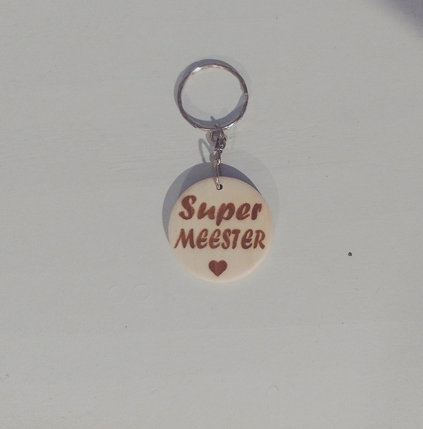 ronde sleutelhanger - super meester