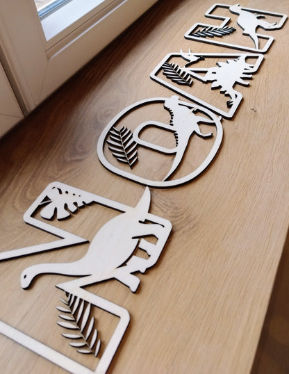 Houten letter thema dino's
