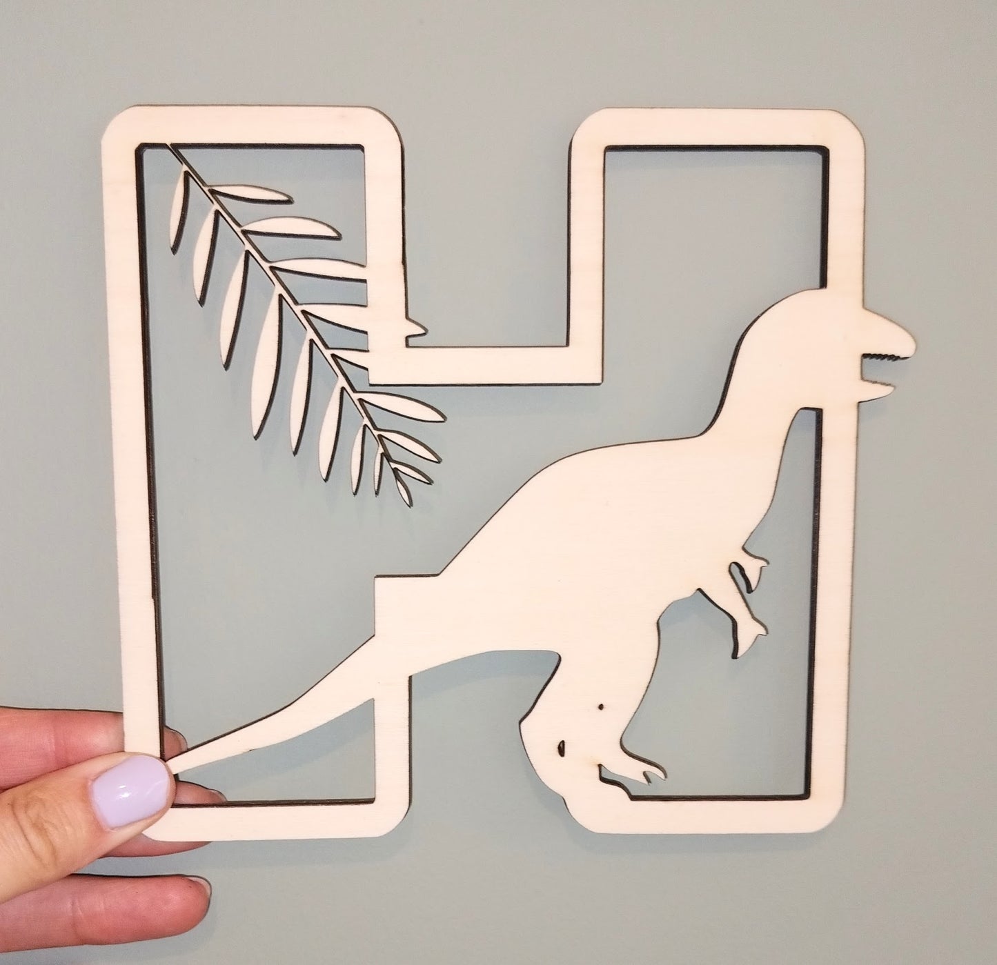 Houten letter thema dino's