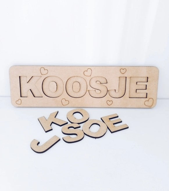 Houten legpuzzel naam
