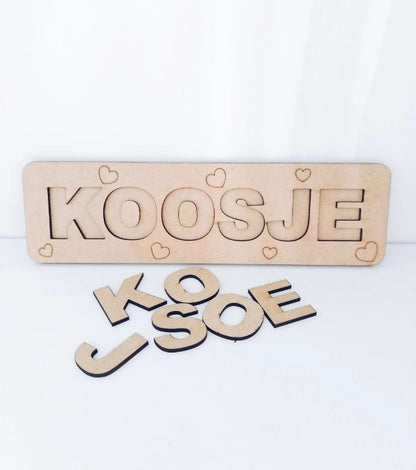 Houten legpuzzel naam